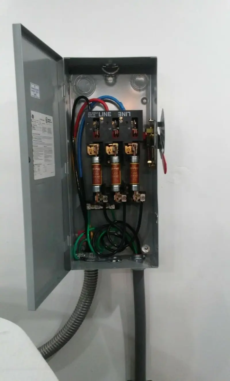 Three-phase disconnect switch installed for Smoke Detector Installation in Taylor Creek